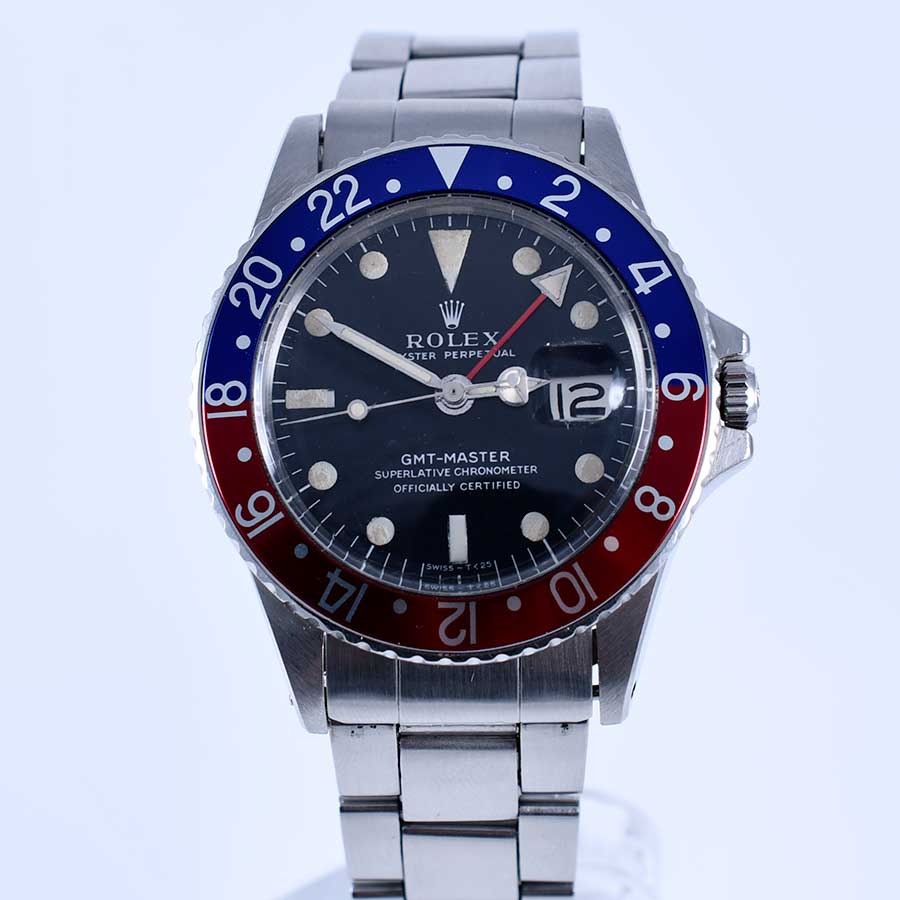 Vintage Rolex GMT-Master ref. 1675 Pepsi with red and blue bezel on a steel Oyster bracelet